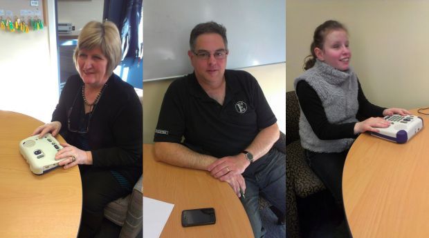 Joy McIntock and Kevin Prince of the Royal New Zealand Foundation of the Blind; Leilu Harrison-Talbot listening to an audio book on her DAISY player.